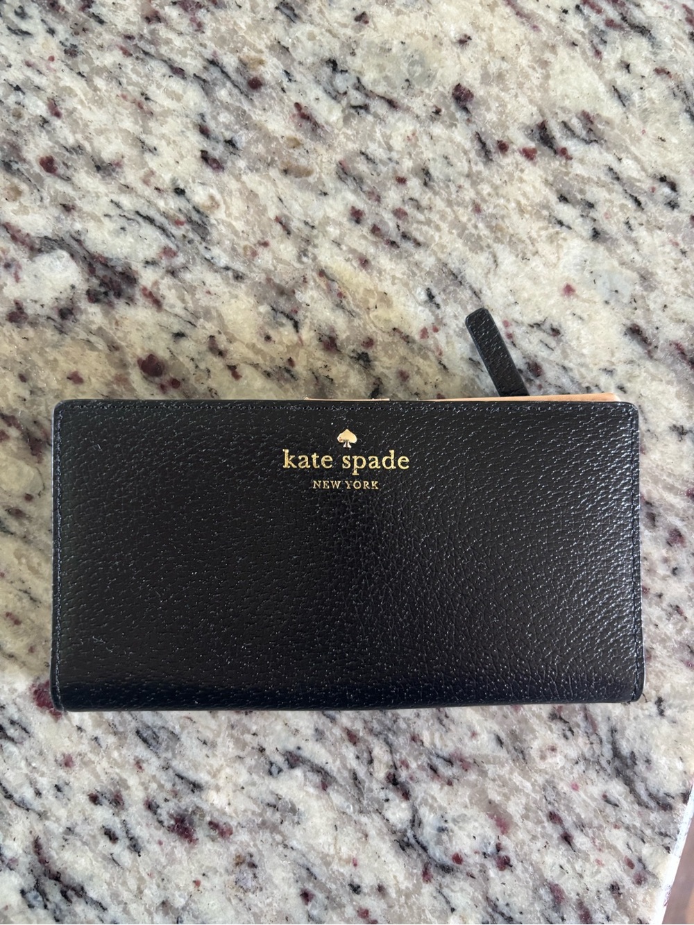 kate spade Black and tan Leather slim bifold Wallet with Gold Logo Accent